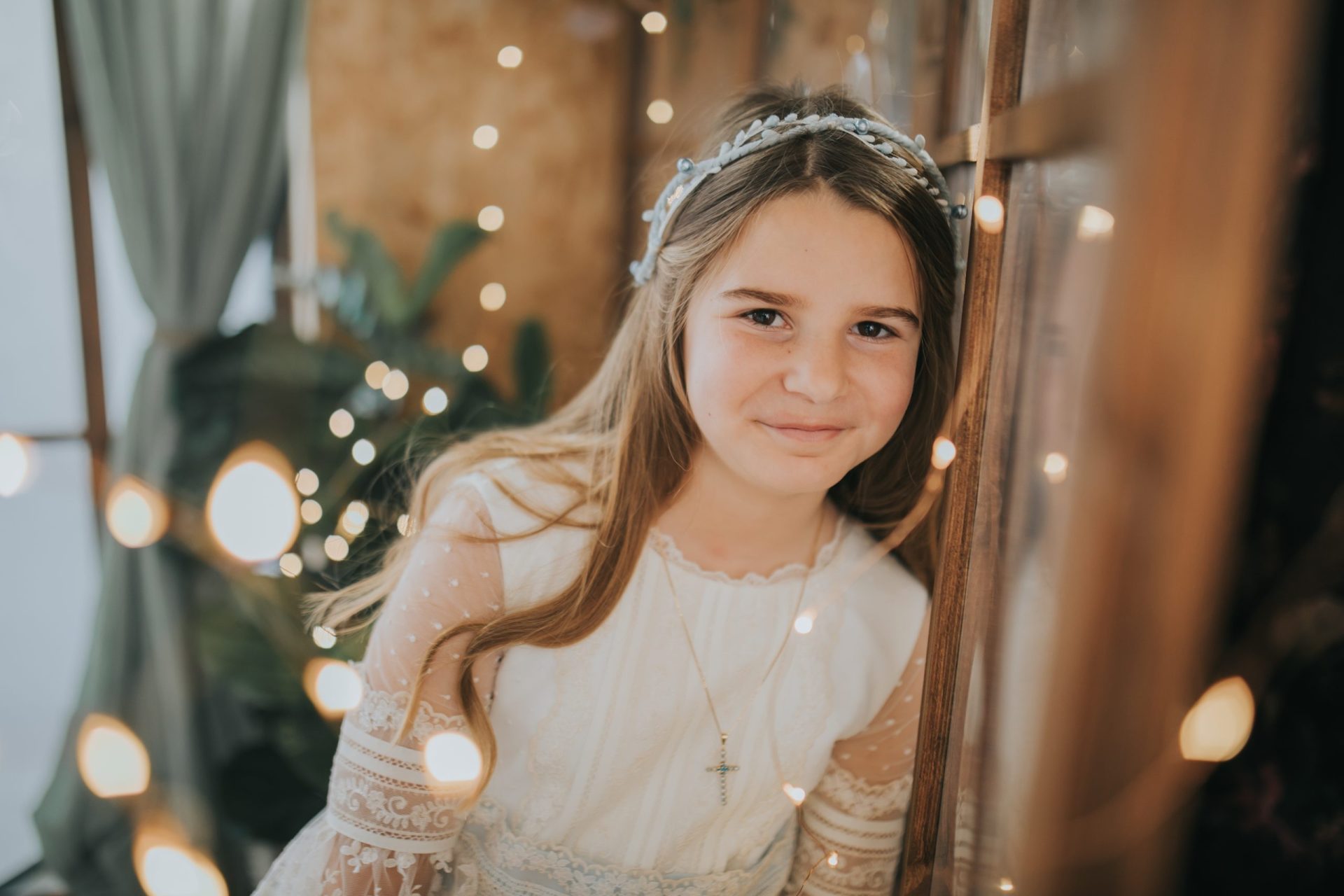 Niña con vestido de comunión